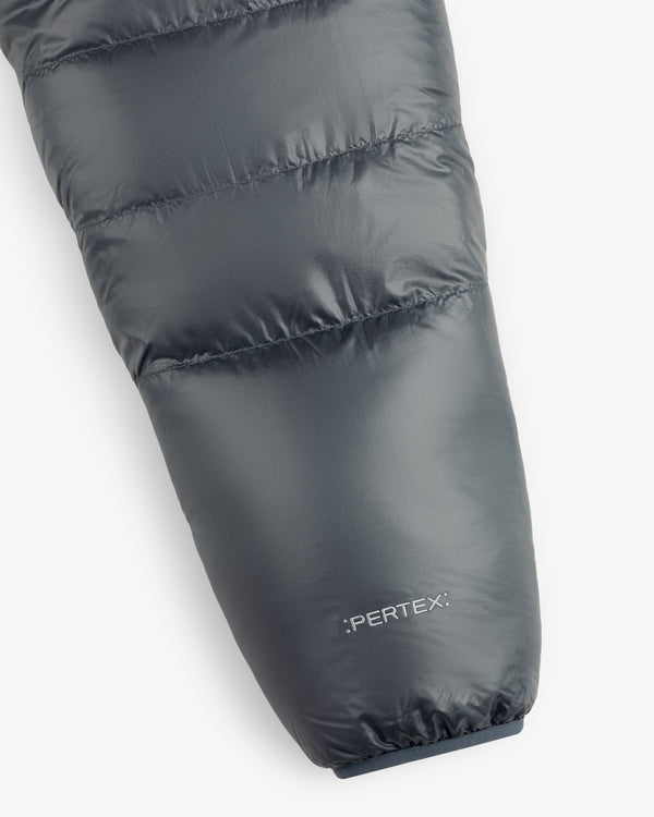 Close-up of ALD/The North Face Reversible Pertex® Nuptse Jacket sleeve with Pertex® logo by the cuff.