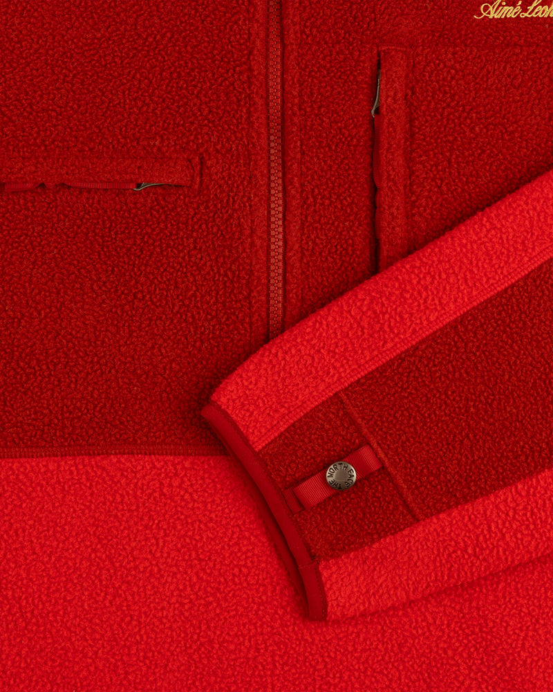 Close-up of the ALD/The North Face ’95 Denali Half-Zip Fleece Pullover showing a pocket, zipper, and snap cuff.