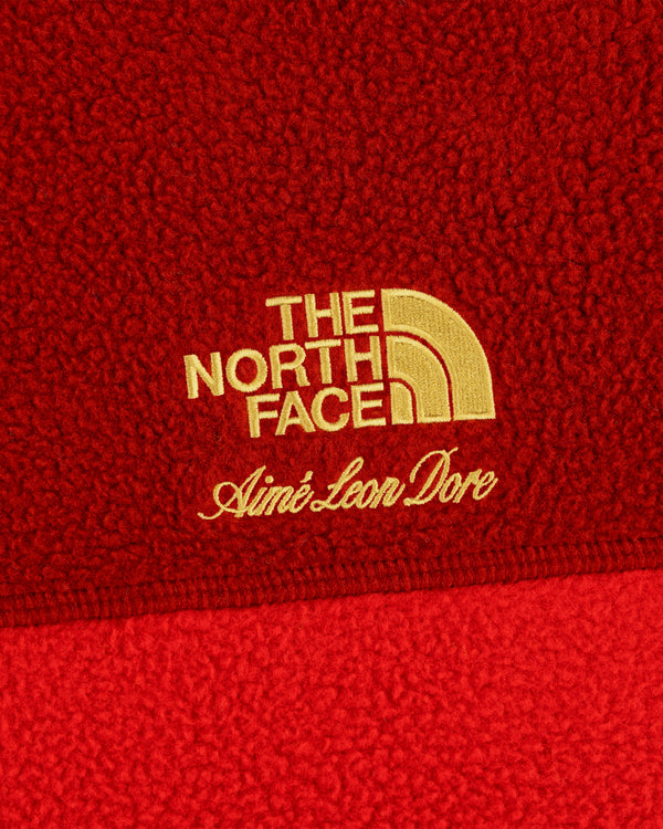ALD/The North Face ’95 Denali Pullover features yellow embroidered logos on a textured red fleece.