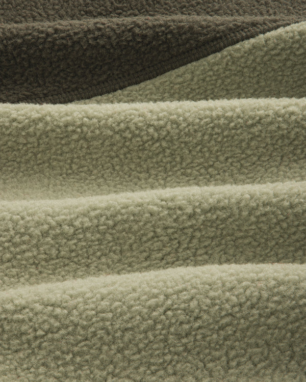Detail of ALD / The North Face ’95 Denali Half-Zip Fleece Pullover in olive and sage green textured fleece.