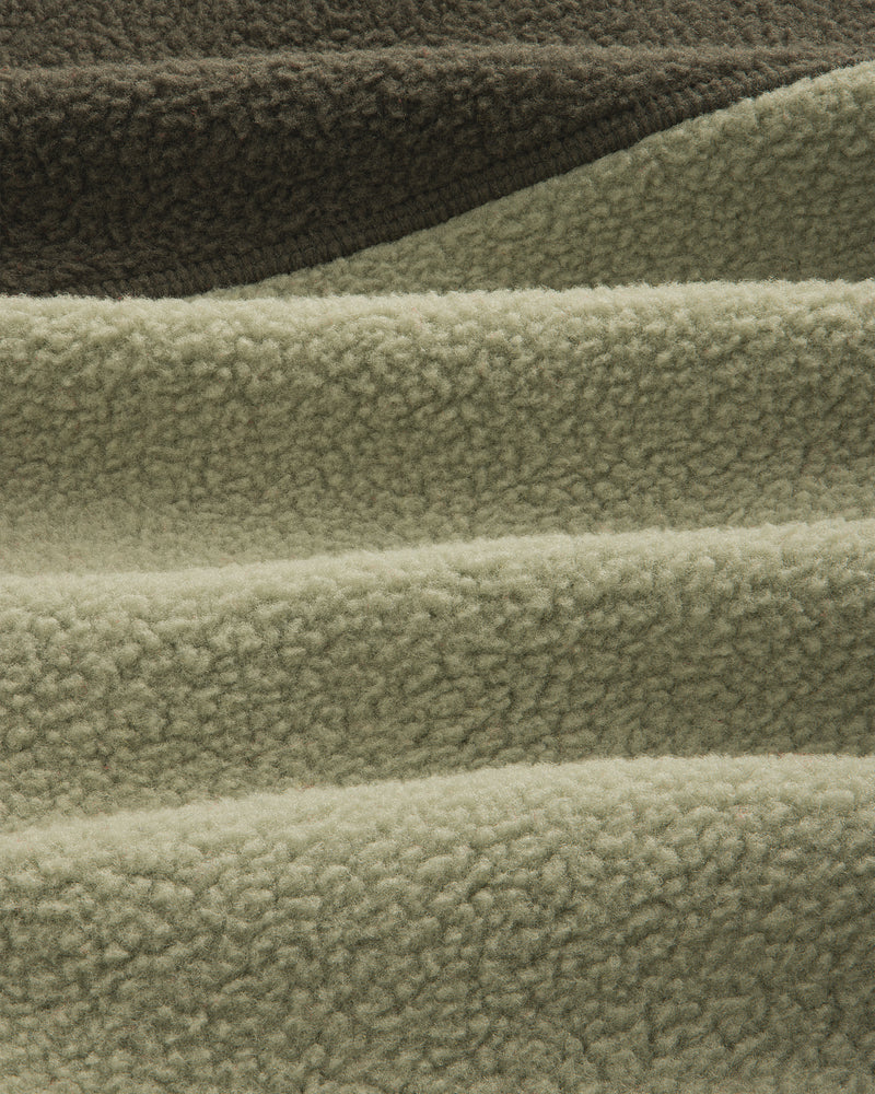 Detail of ALD / The North Face ’95 Denali Half-Zip Fleece Pullover in olive and sage green textured fleece.