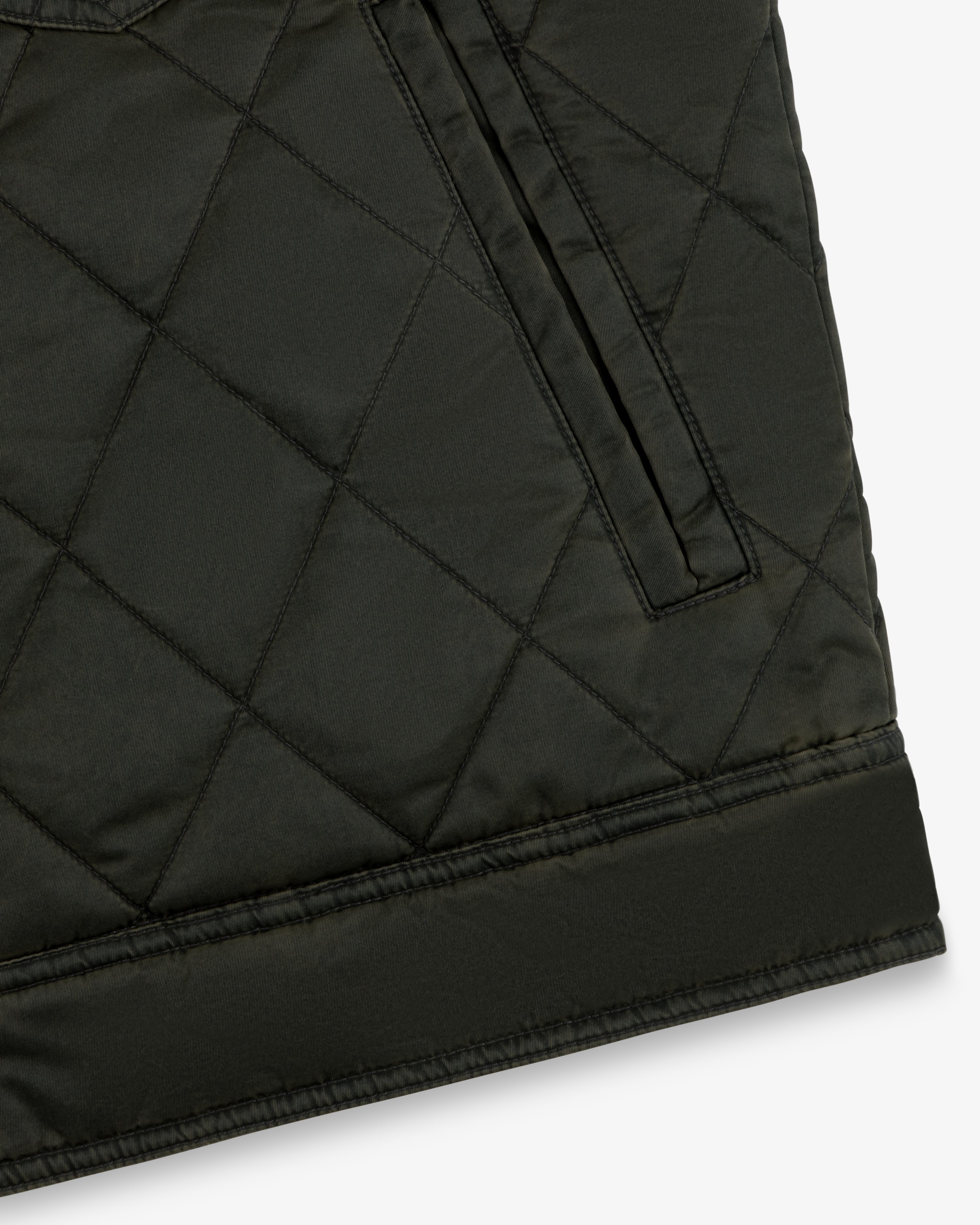 Olive green Quilted Trucker Jacket with a side pocket and a solid hem.
