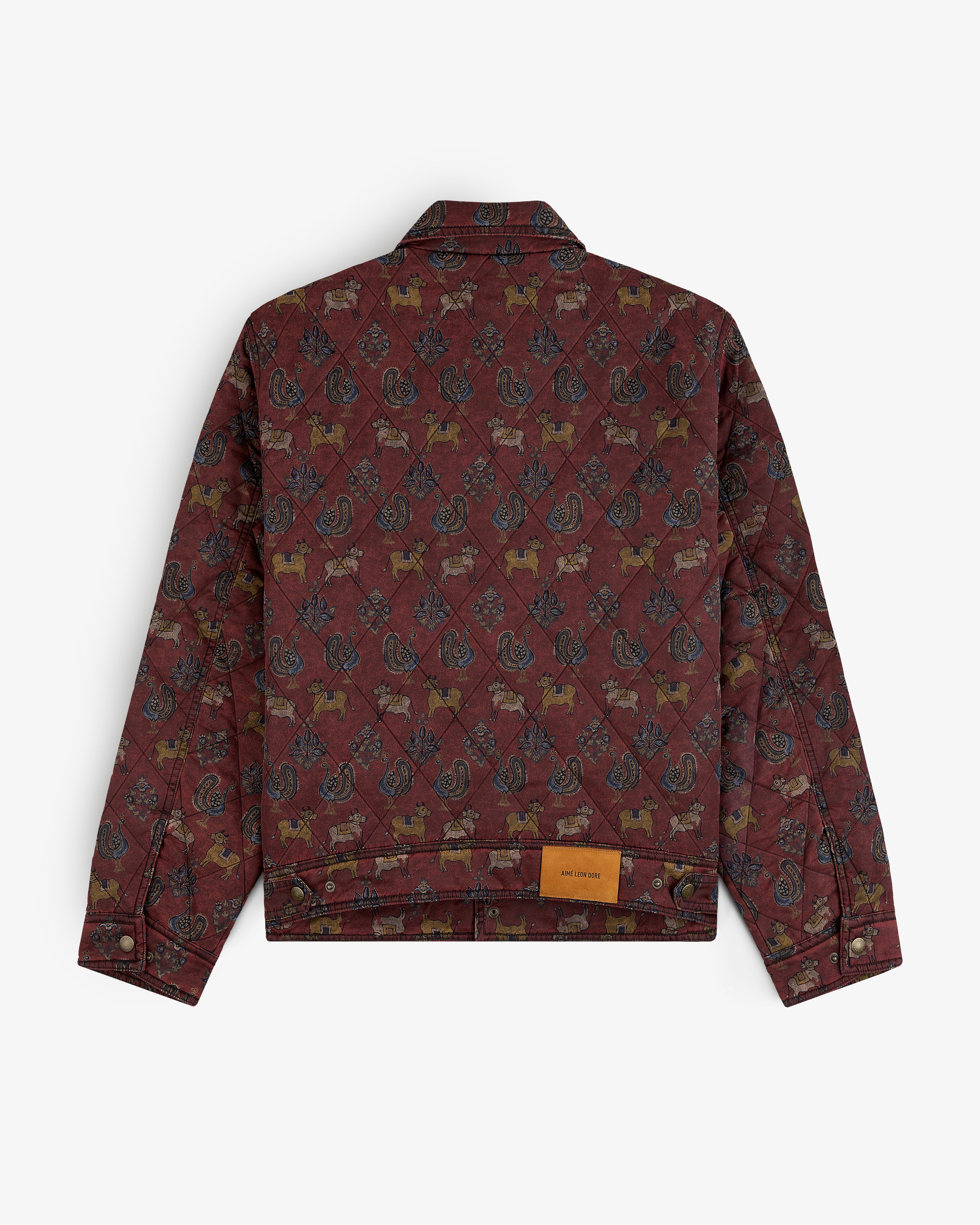Back view of a burgundy Quilted Trucker Jacket featuring an all-over animal and floral print.