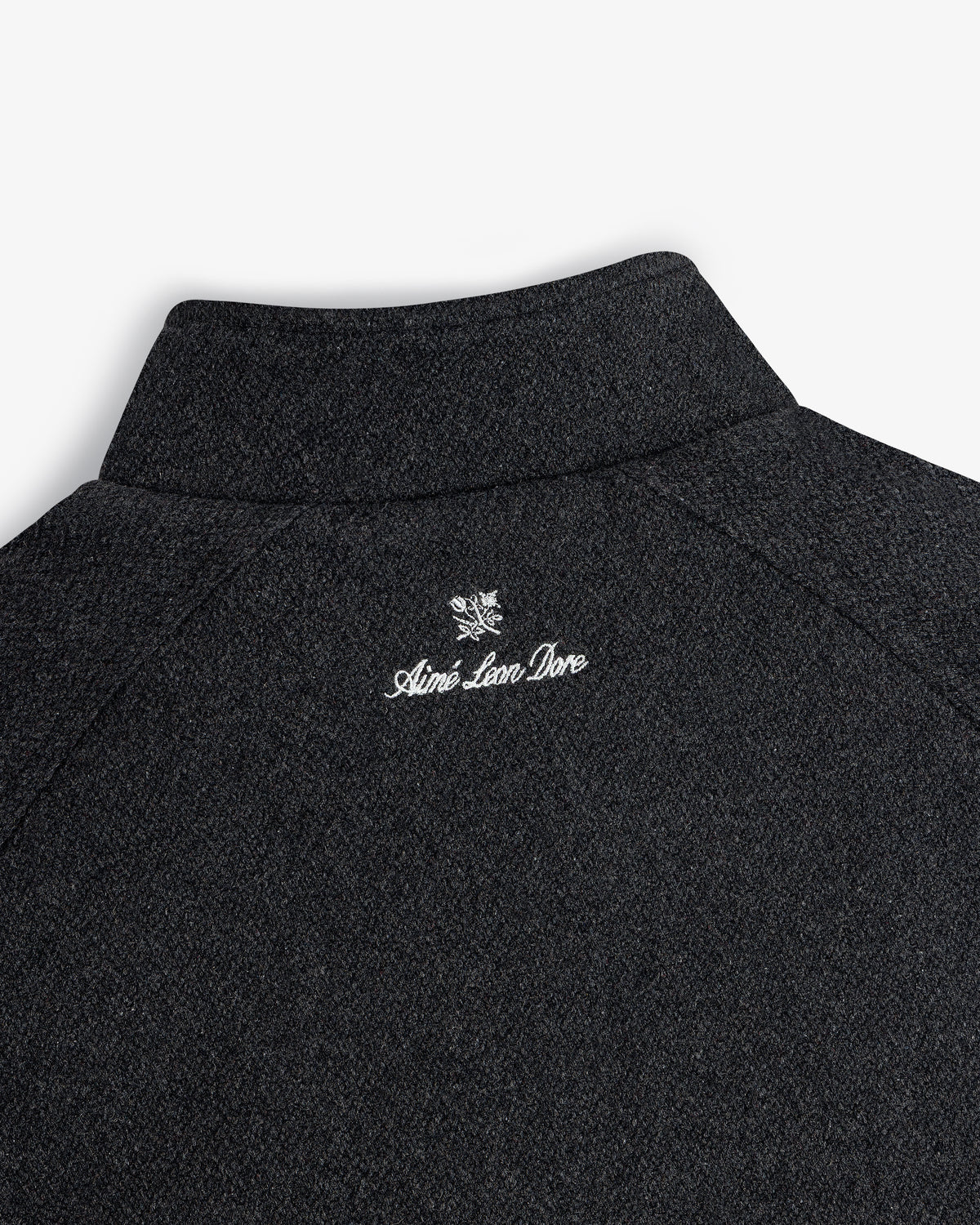Dark wool NY Highlanders Varsity Jacket with Aimé Leon Dore and crest embroidered in white near the back collar.