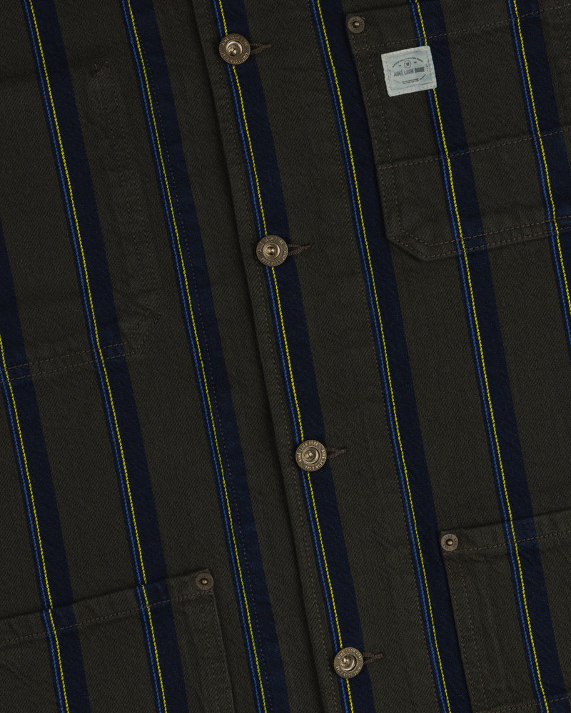 Close-up of the Striped Denim Chore Jacket with blue/yellow stripes, brown buttons, and a pocket label.