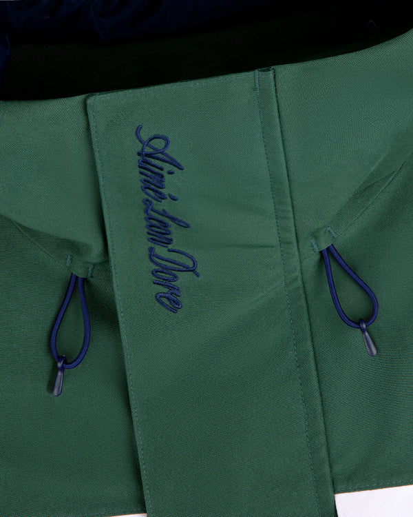 Green GORE-TEX Striped Sailing Jacket with blue drawstrings and Aimé Leon Dore embroidered in blue on the flap.