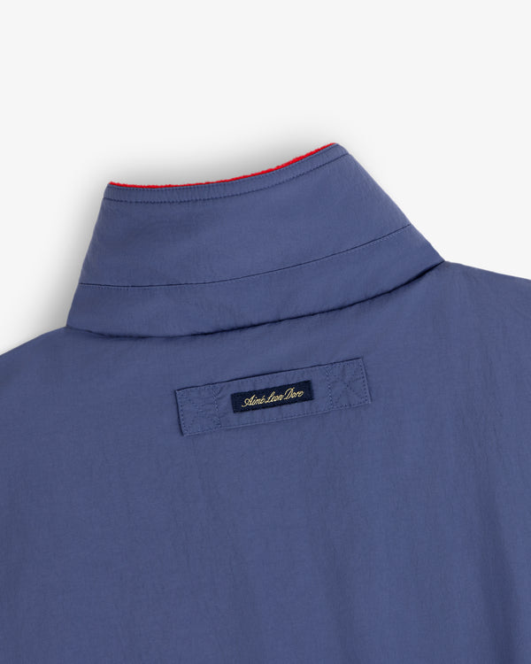 Fleece Lined Sport Windbreaker with black label and red stitching along the edge of the collar.