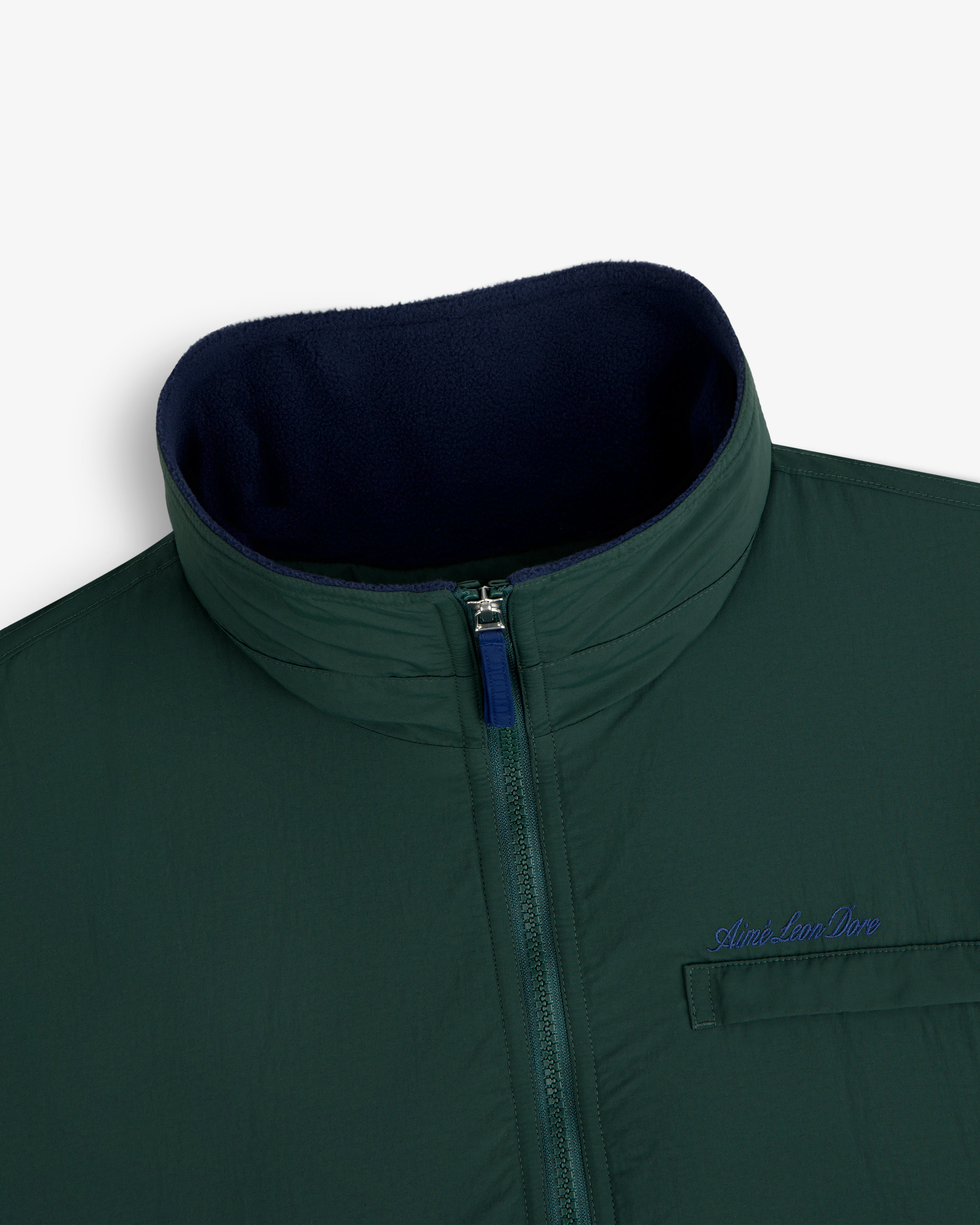 Fleece Lined Sport Windbreaker with green zip-up, high collar, chest pocket, and blue Aimé Leon Dore embroidery.