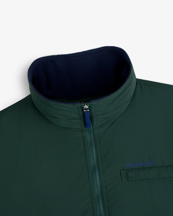 Fleece Lined Sport Windbreaker with green zip-up, high collar, chest pocket, and blue Aimé Leon Dore embroidery.