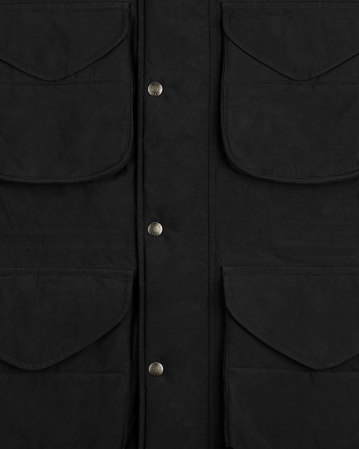 Close-up of a black Down-Filled Surplus Parka with four large flap pockets and a central placket with metal snap buttons.