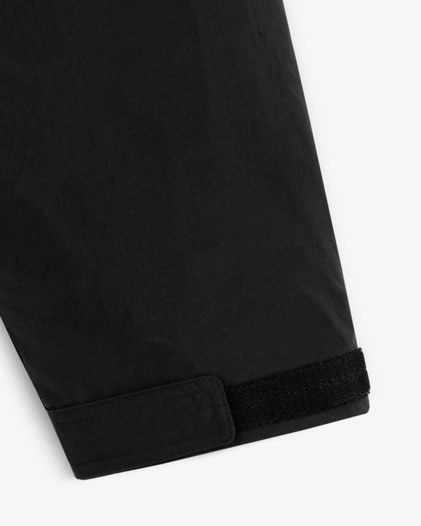 Black sleeve cuff with a velcro adjustable strap on the Down-Filled Surplus Parka.