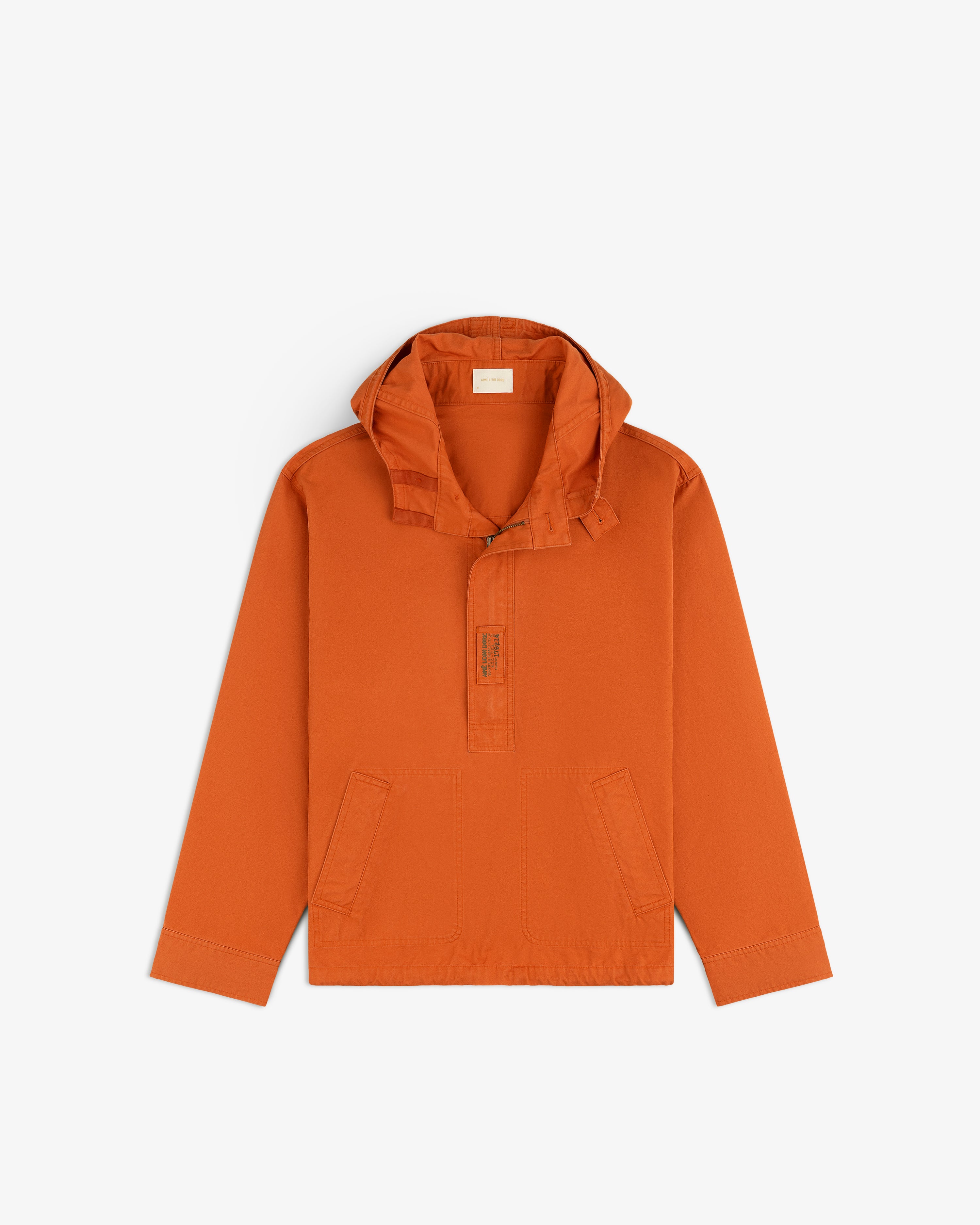 Burnt orange Garment Washed Anorak hooded pullover with a quarter-zip placket and two front pockets.
