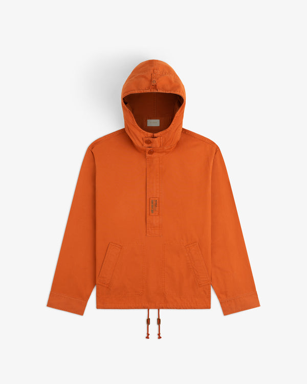 Garment Washed Anorak: an orange hooded pullover jacket with a button placket, front pocket, and drawstring hem.