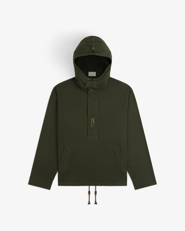 Garment Washed Anorak in olive green, featuring a hooded pullover design, buttoned placket, and drawstring hem.