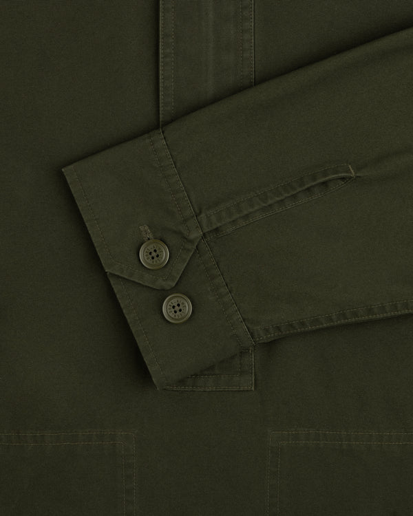 Olive green Garment Washed Anorak sleeve with a two-button cuff.