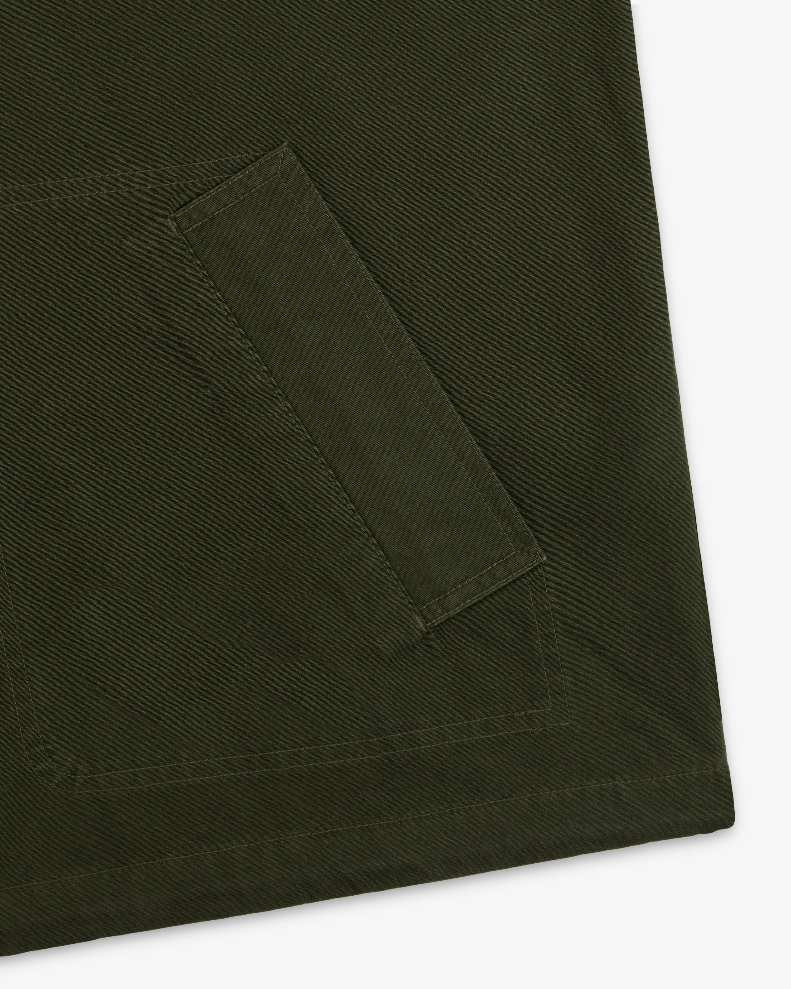 Dark olive green Garment Washed Anorak with a rectangular patch pocket.