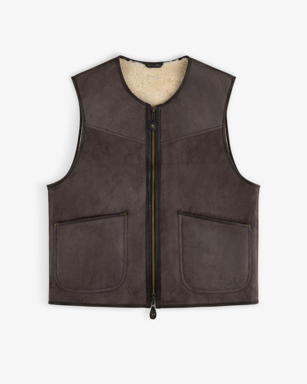 Shearling Biker Vest: dark brown sleeveless jacket with a cream-colored fuzzy lining and two front pockets.