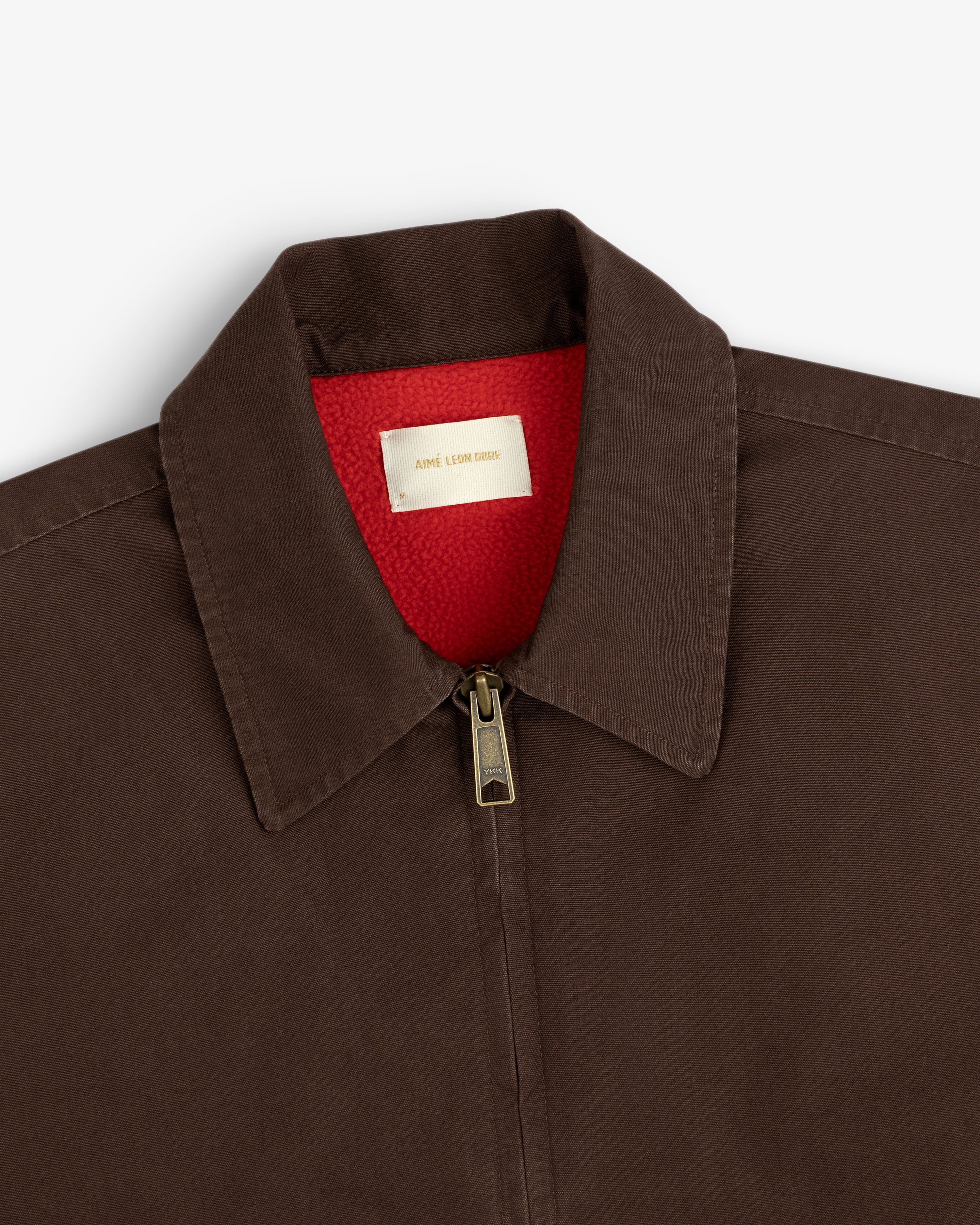 Fleece Lined Mechanic Jacket in dark brown with a bright red fleece lining and a classic collar.