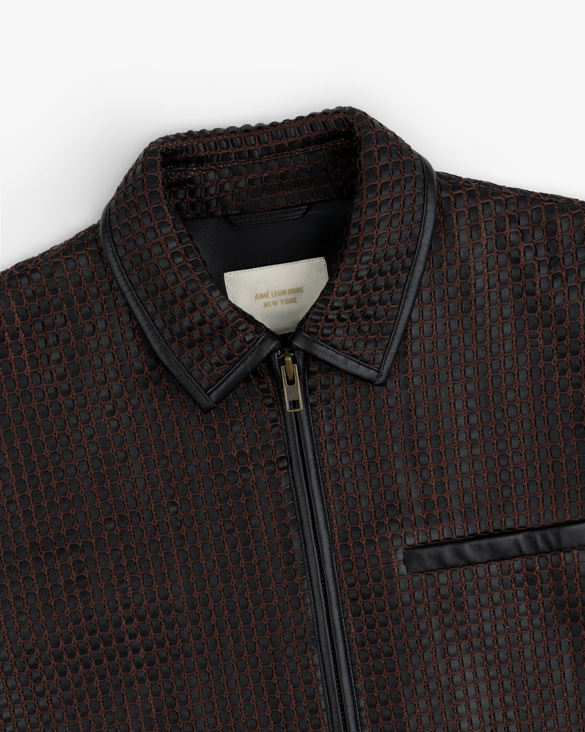 Woven Leather Jacket in a black and brown grid pattern with a zippered front and a leather collar.