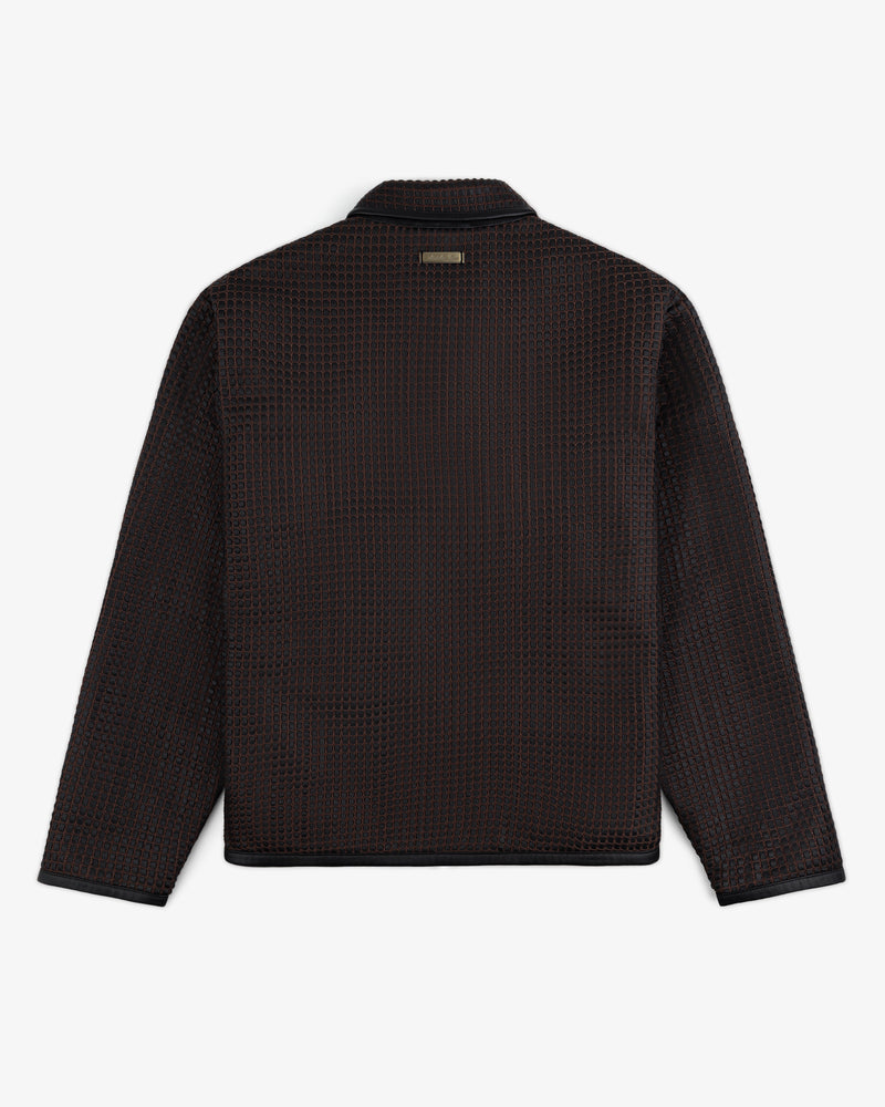 Back view of a Woven Leather Jacket with a dark, textured grid pattern and a metal brand tag at the collar.