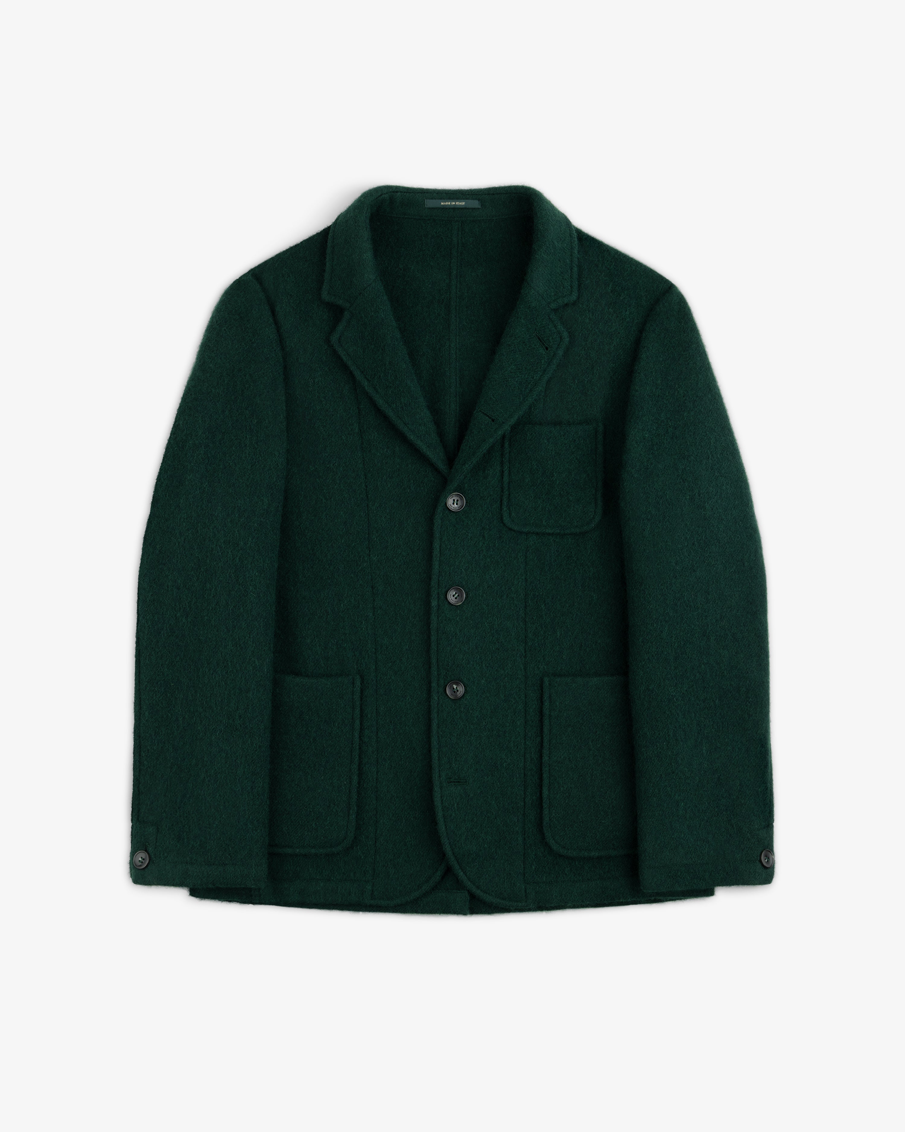 Dark green wool sport coat featuring three buttons, a chest pocket, and two lower patch pockets.