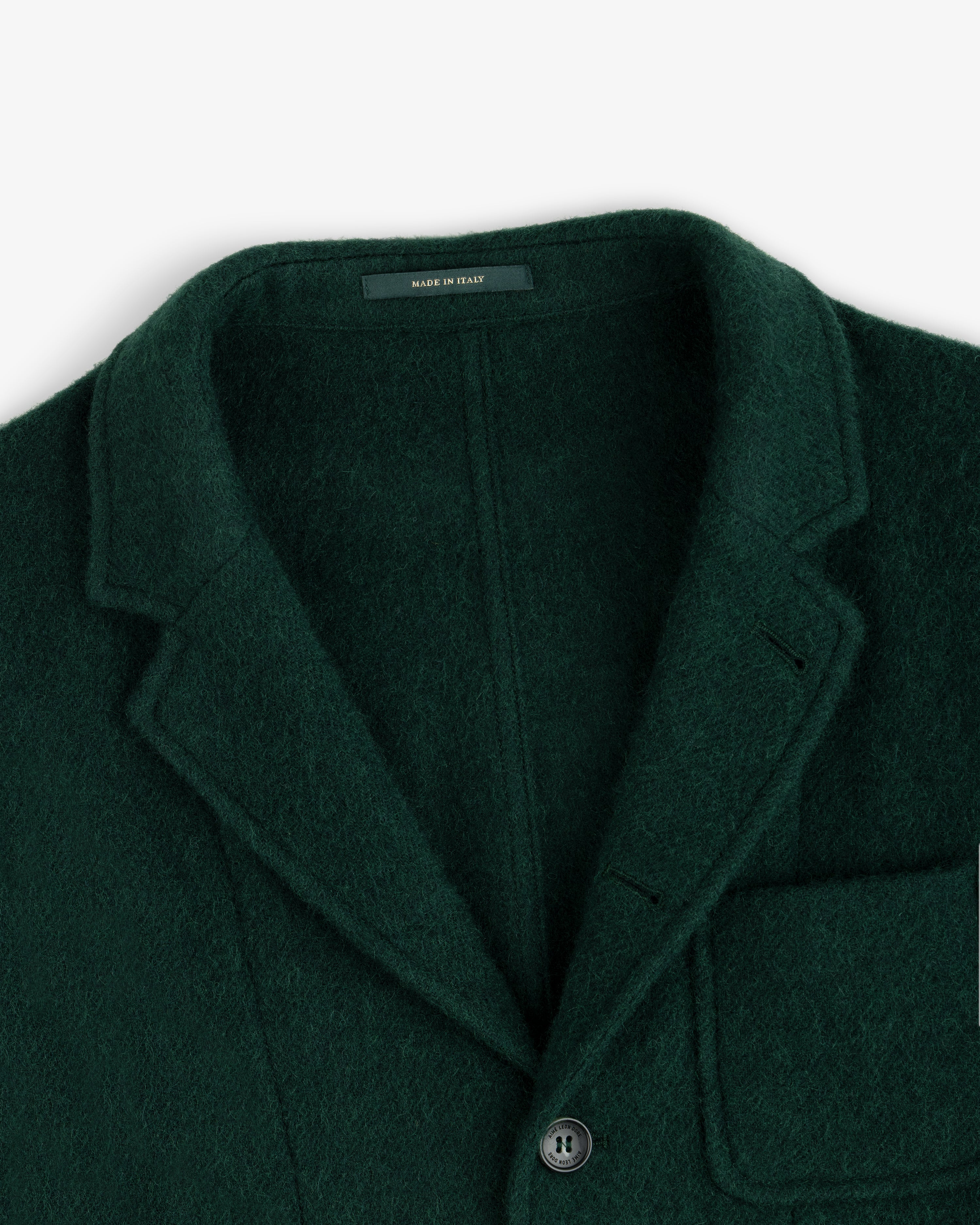 Dark green Wool Sport Coat with a notch lapel and a Made in Italy label at the collar.