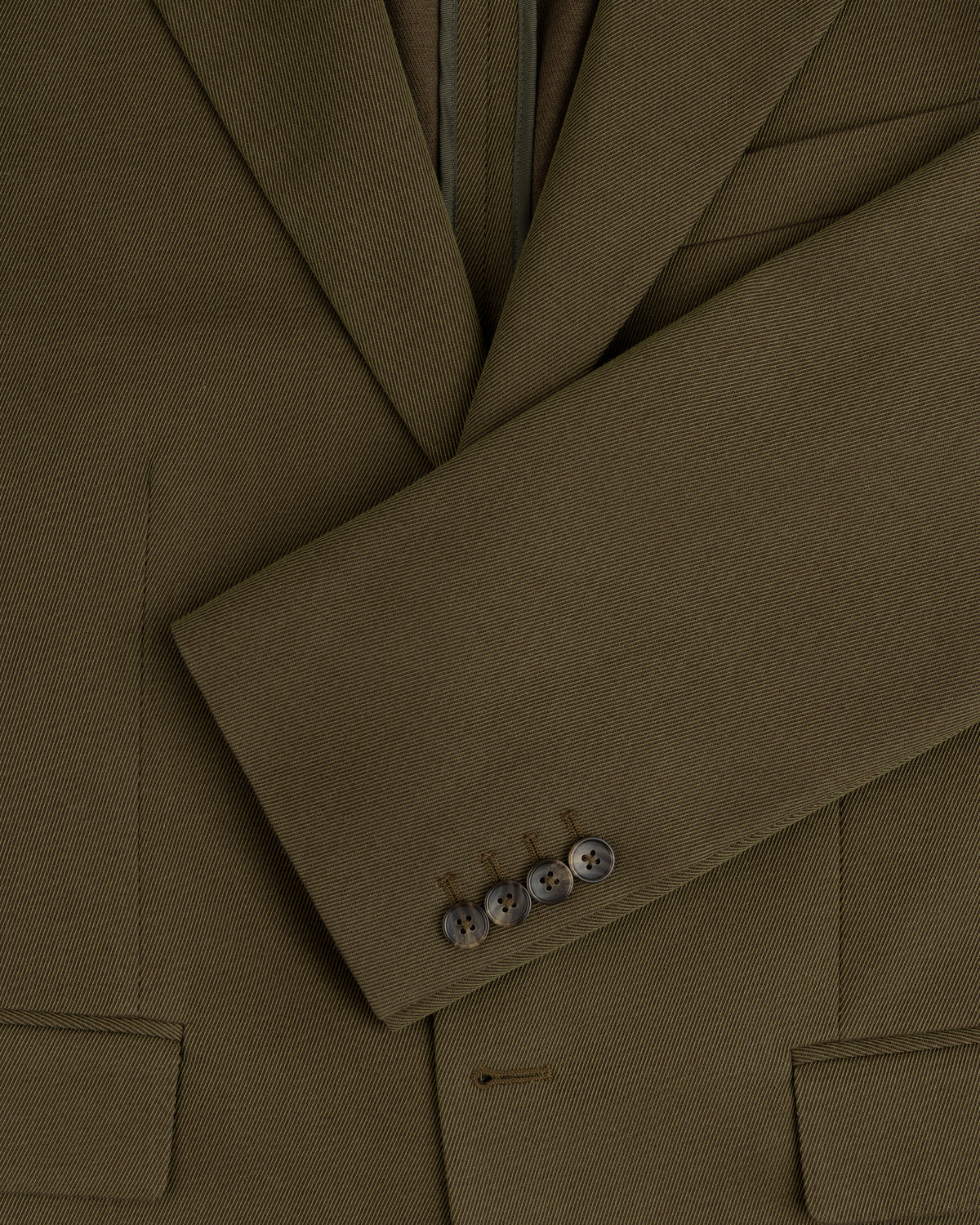 Olive green Single-Breasted Wool Blend Suit Jacket with four buttons on the cuff.