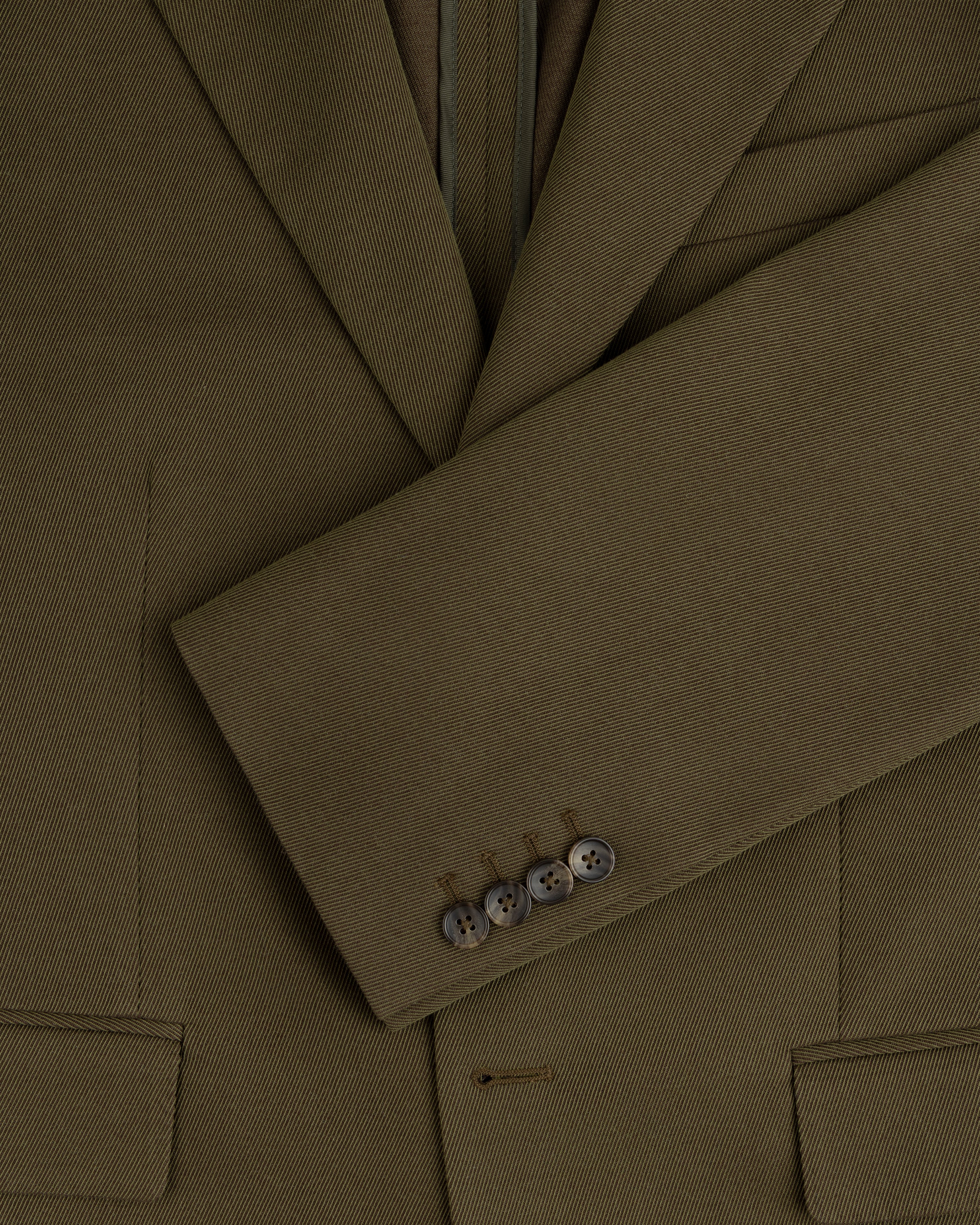 Olive green Single-Breasted Wool Blend Suit Jacket with four buttons on the cuff.