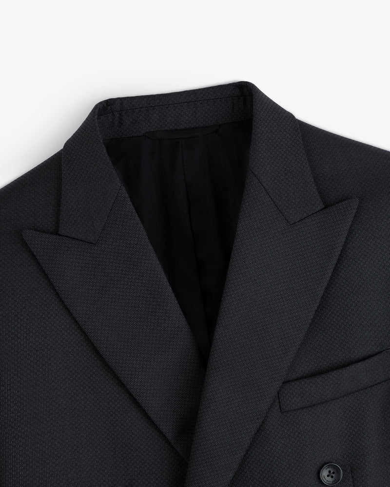 Close-up of a dark grey Double-Breasted Wool Jacquard Suit Jacket with peaked lapels.