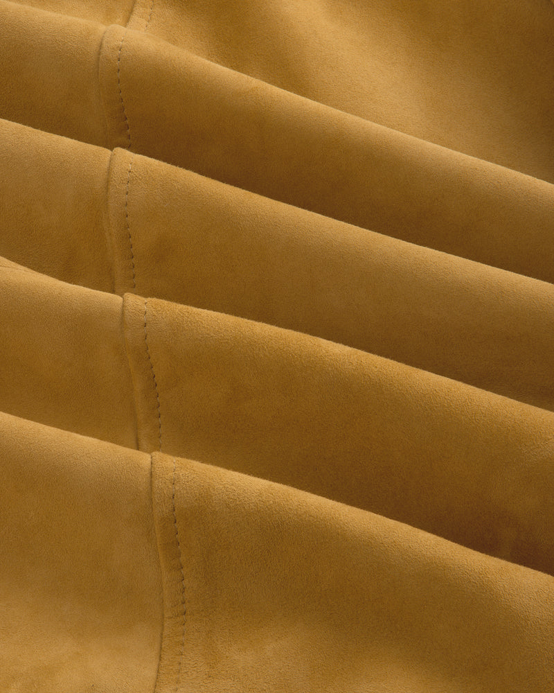 Close-up of brown suede on the Suede Cafe Racer Jacket, highlighting stitching and soft texture.