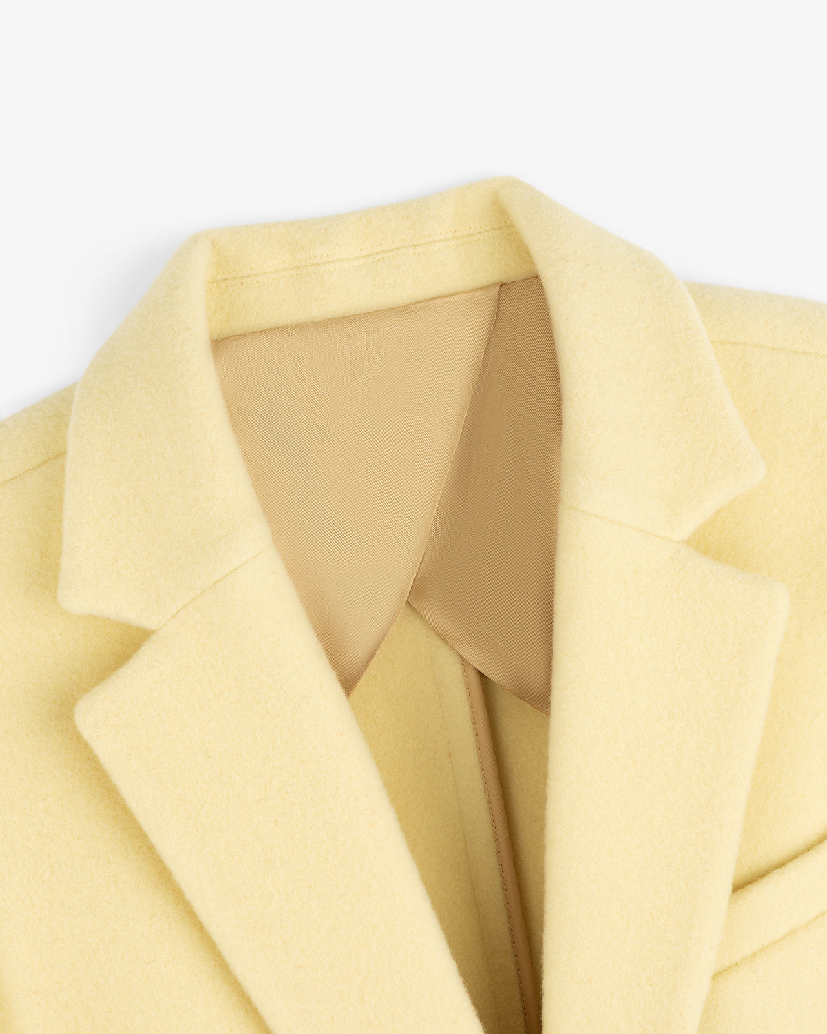 Pale yellow Wool Sportcoat with a tan collar lining.