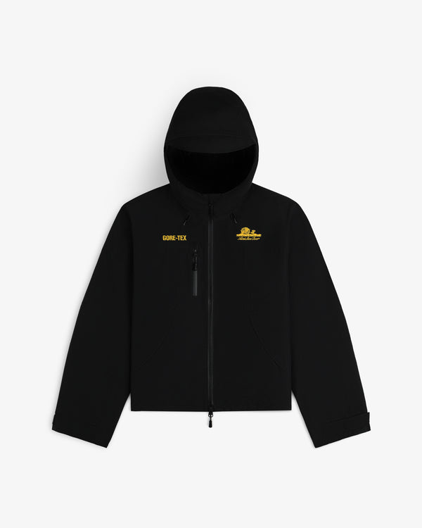 Black hooded Cropped GORE-TEX Shell Jacket with yellow text and a logo on the chest.