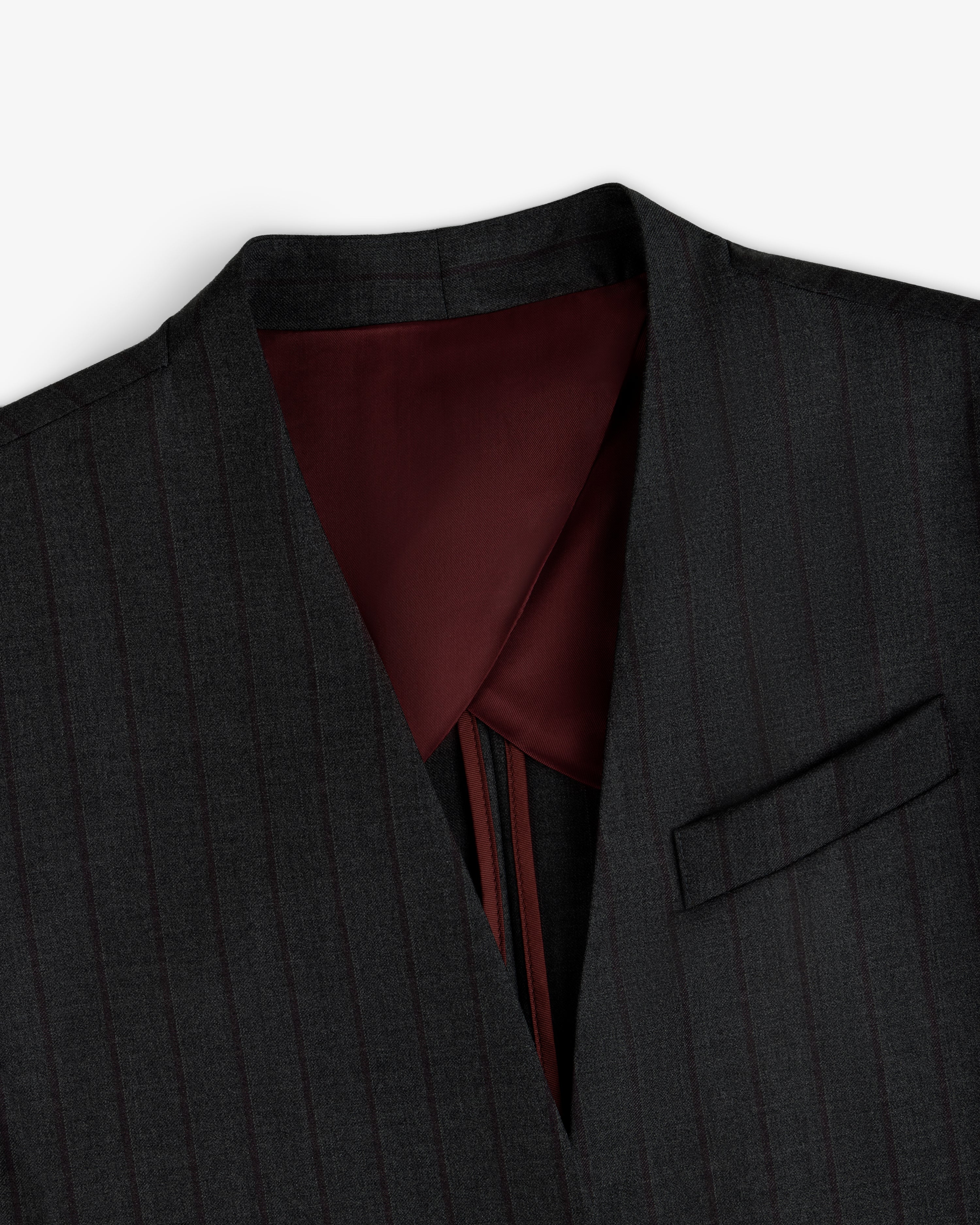 Collarless Striped Blazer in dark grey with pinstripes and a deep red lining.