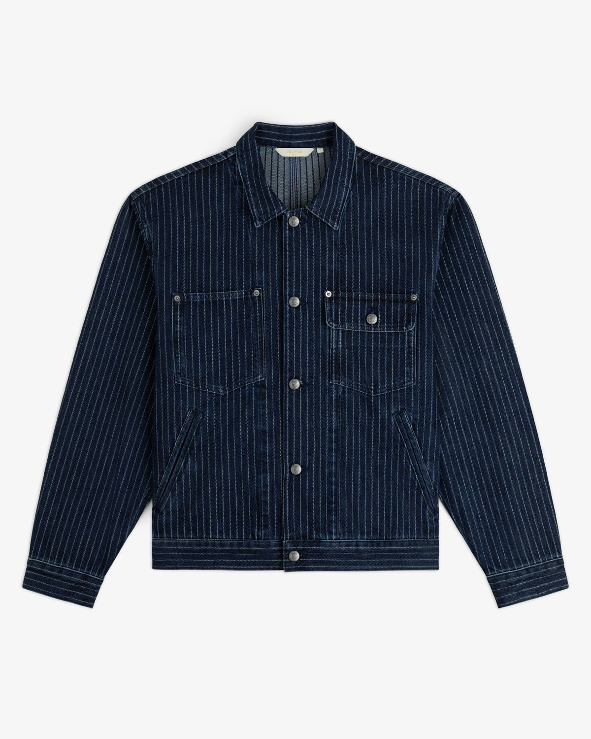 Chalk Stripe Denim Trucker Jacket in navy with pinstripes, two chest pockets, button front, and long sleeves flat-lay.