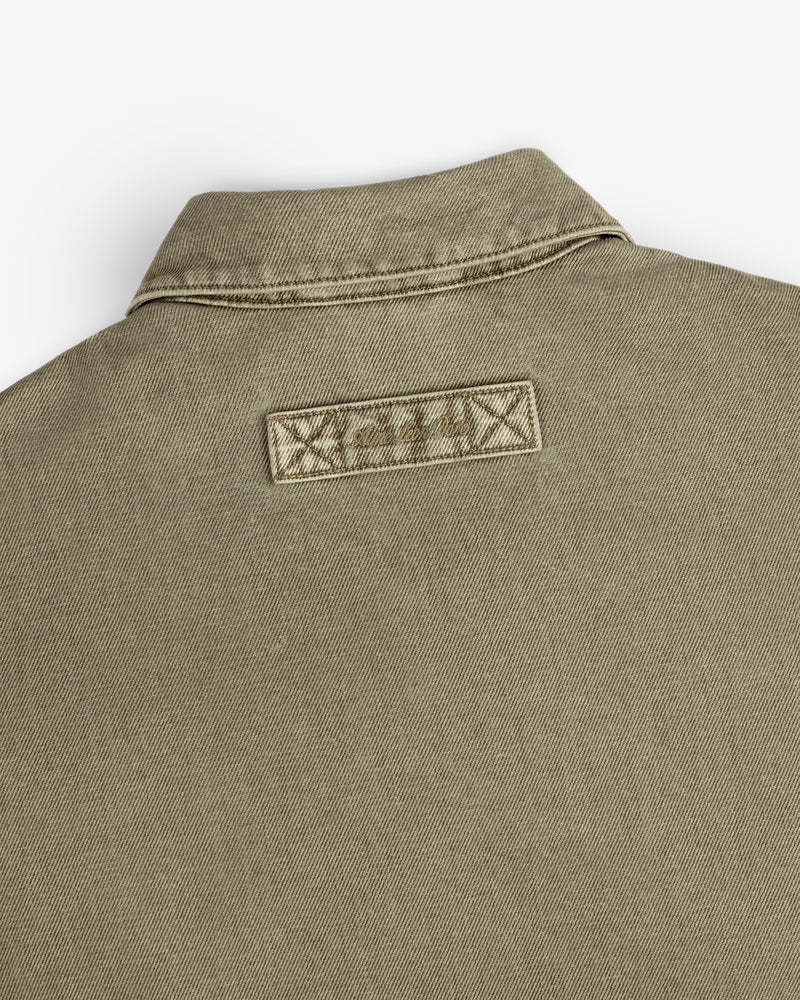 Olive green Flocked Denim Jacket collar with a rectangular patch stitched below the neckline.