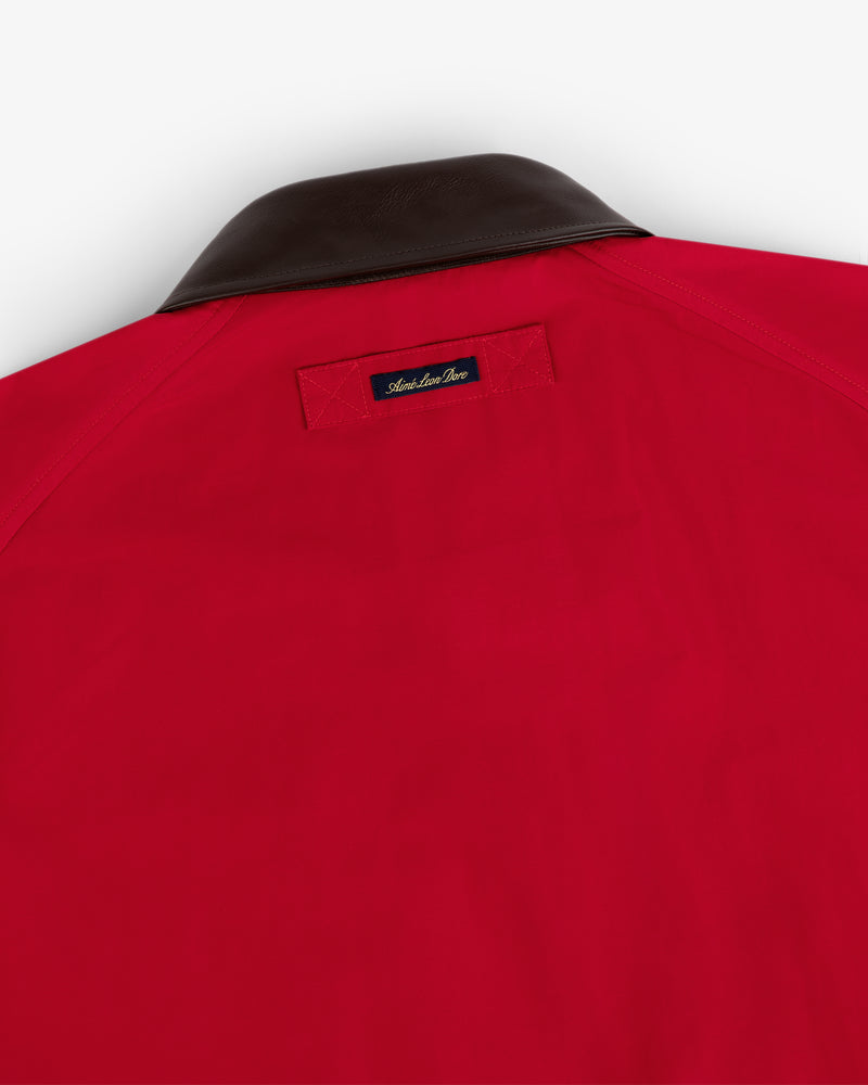 Lightweight Barn Jacket in red, black collar, back view with small black tag near neckline.