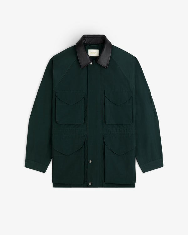 Lightweight Barn Jacket in dark green with four front pockets and black collar, shown flat on white background.