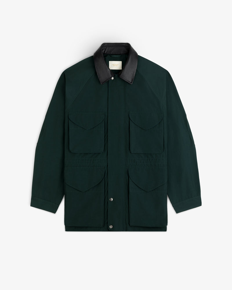 Lightweight Barn Jacket in dark green with four front pockets and black collar, shown flat on white background.