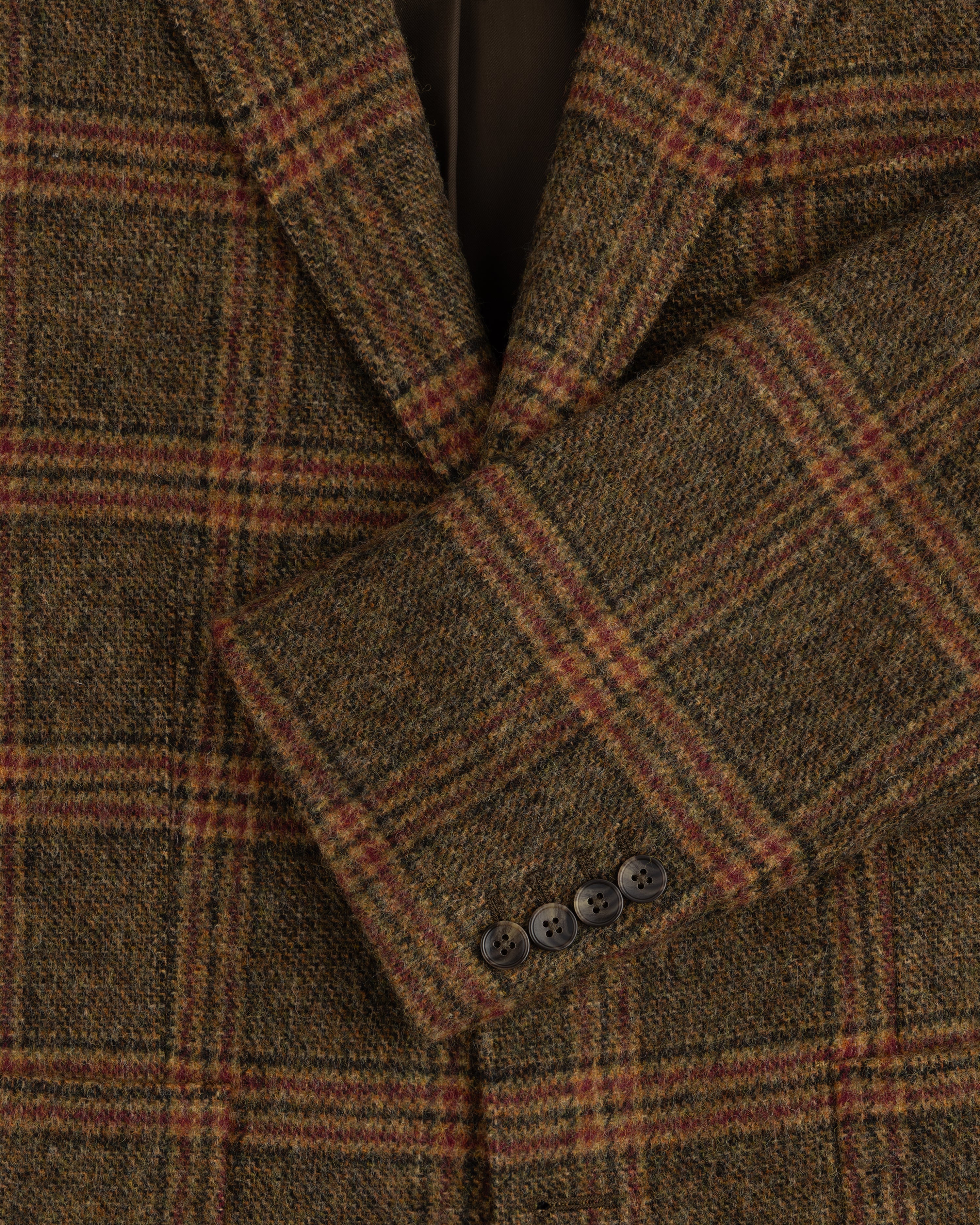 Single-Breasted Plaid Tweed Suit Jacket in brown with four buttons on the sleeve cuff.