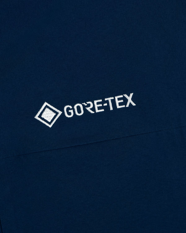 Navy fabric with white Yankees GORE-TEX logo and geometric symbol embroidery.