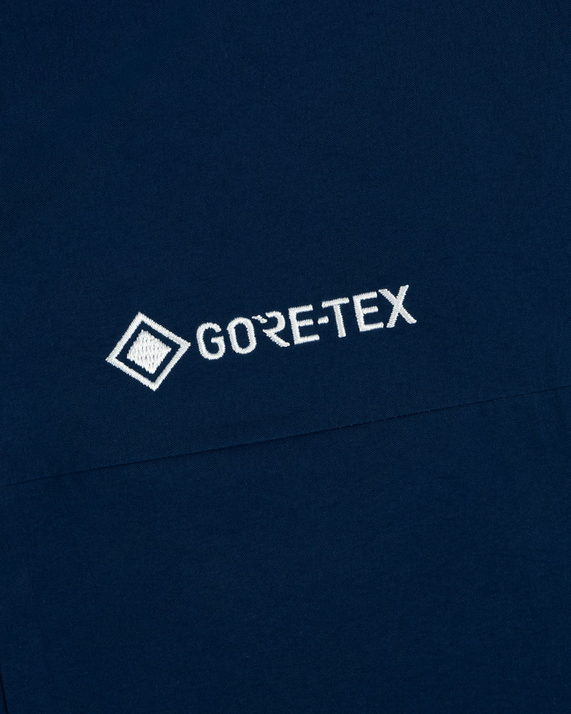 Navy fabric with white Yankees GORE-TEX logo and geometric symbol embroidery.