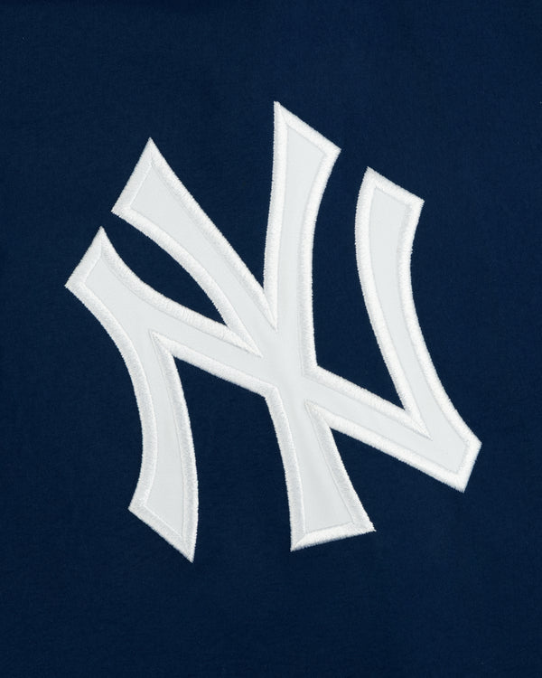 Yankees GORE-TEX Rain Delay Jacket featuring a white NY logo on dark blue, inspired by the iconic baseball team.