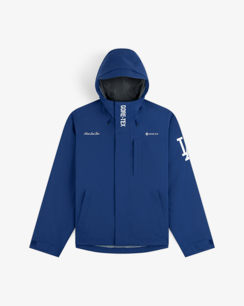 Dodgers GORE-TEX Rain Delay Jacket in blue with white logos, front zipper, and side pockets on white background.