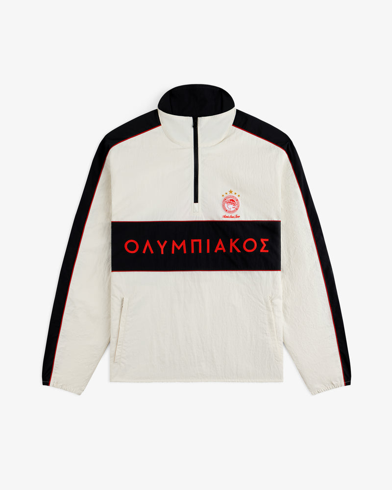ALD / Olympiacos F.C. Nylon Quarter Zip Pullover in off-white with black sleeve stripes and a red chest band with Greek text.