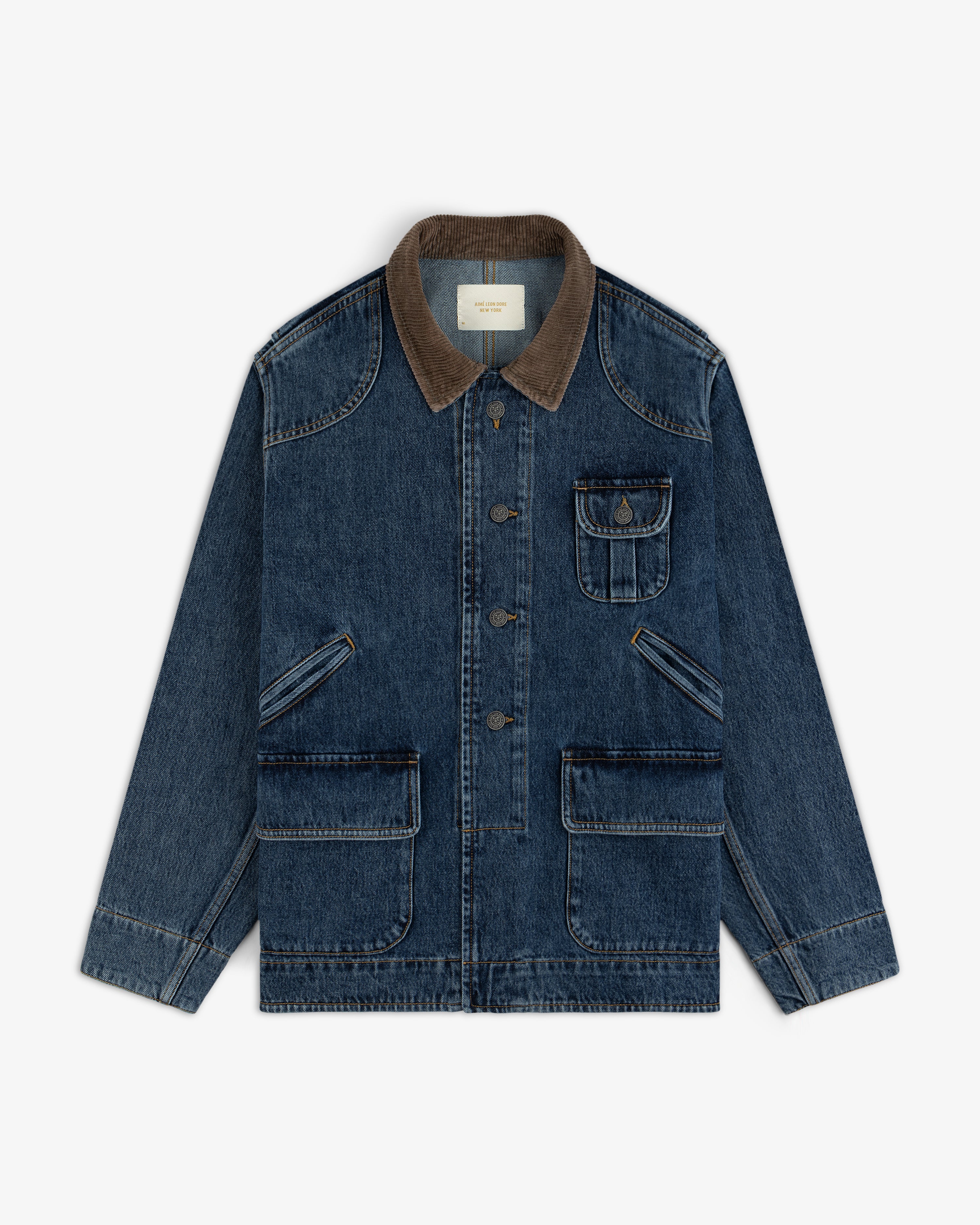 Denim Chore Coat in blue with a brown corduroy collar and four front pockets.
