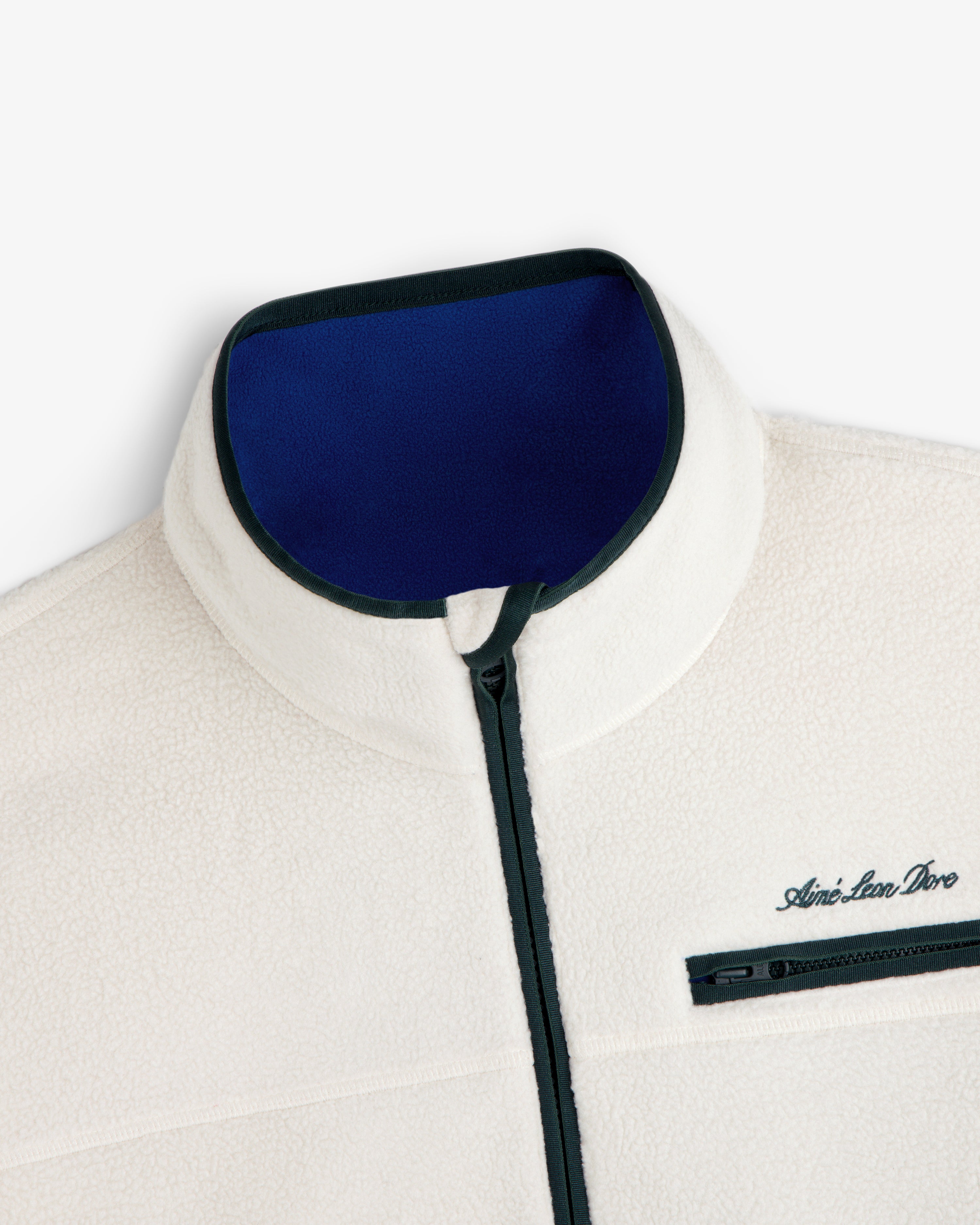 Off-white Script Fleece Half Zip Pullover with a blue inner collar and a black chest pocket.