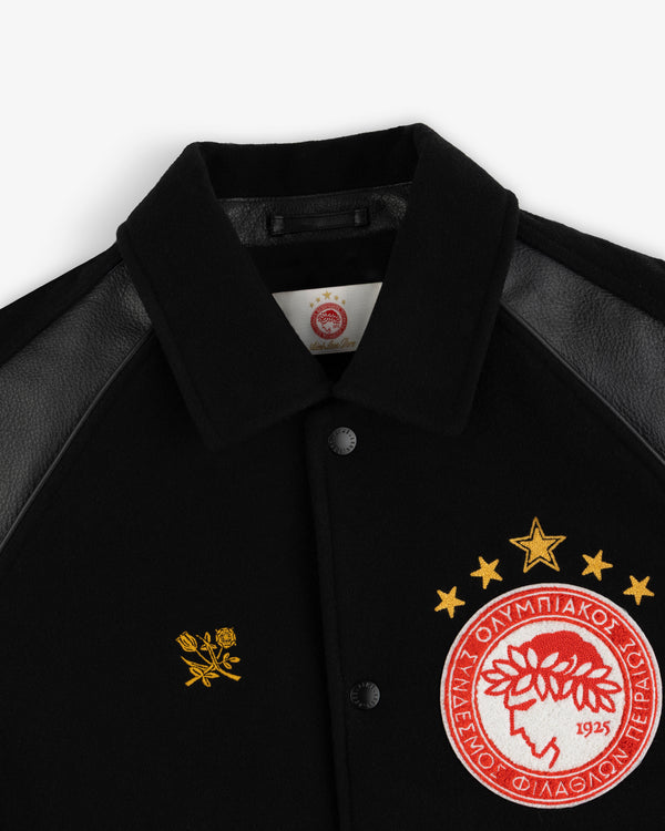 ALD / Olympiacos F.C. Team Leather Jacket with black sleeves, an embroidered rose, and a circular team crest.