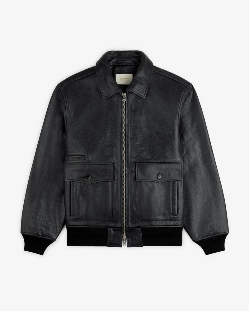Napa Leather Bomber Jacket in black featuring a front zipper, two buttoned pockets, and ribbed cuffs.