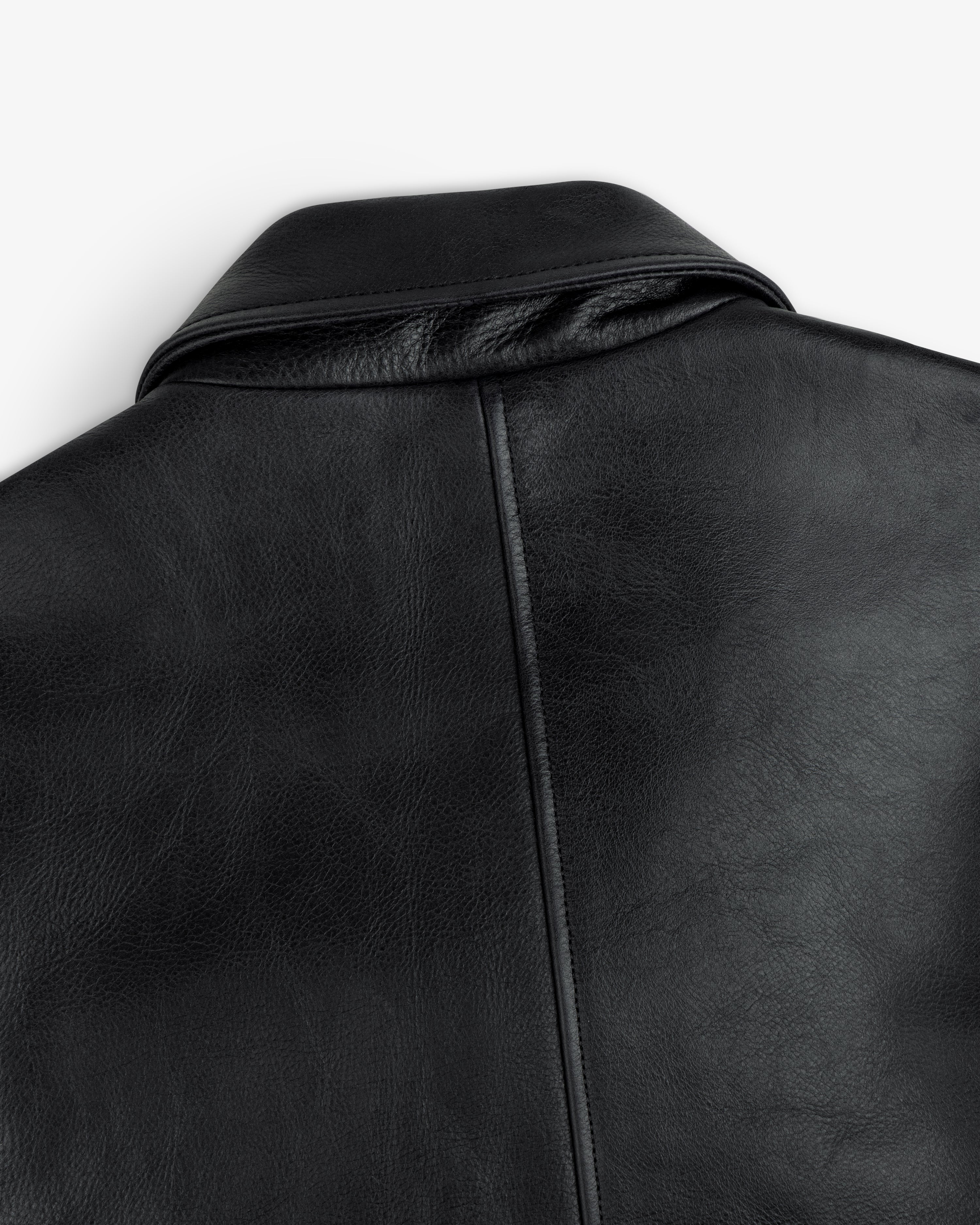 Close-up of the back collar and upper back seam of the black Napa Leather Bomber Jacket.