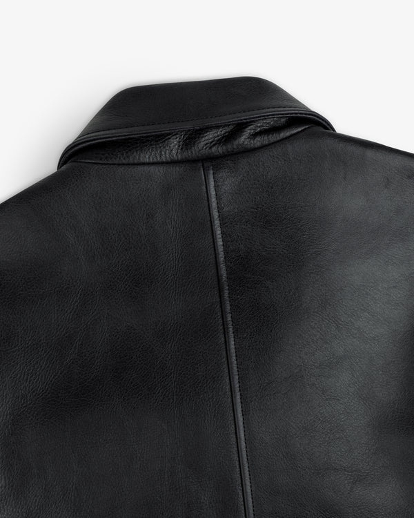 Close-up of the back collar and upper back seam of the black Napa Leather Bomber Jacket.